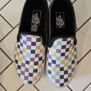 Vans Black and White Slip-On Sneakers